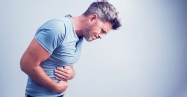 lower back pain and stomach pain