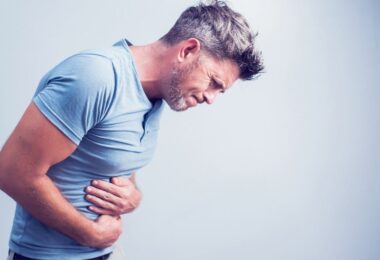 lower back pain and stomach pain